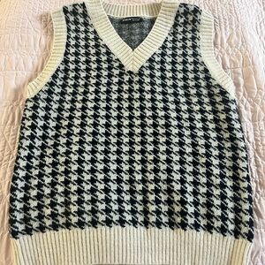Women’s black and white sweater vest